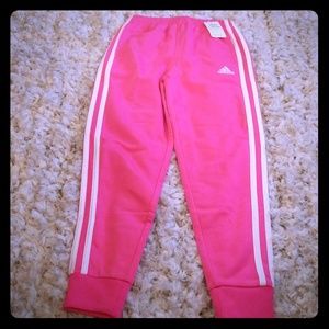 Adidas pink and white track suit